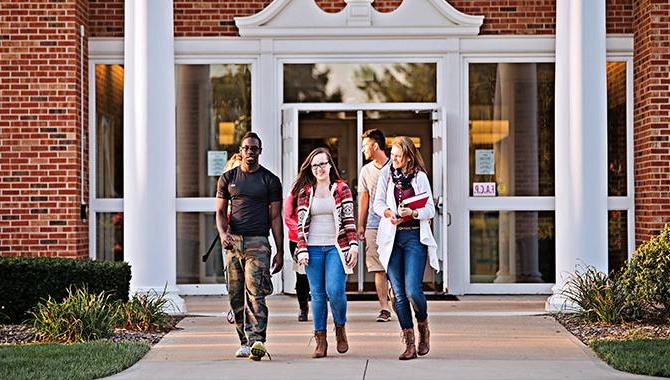 Students exiting the Cunningham Center Entrance